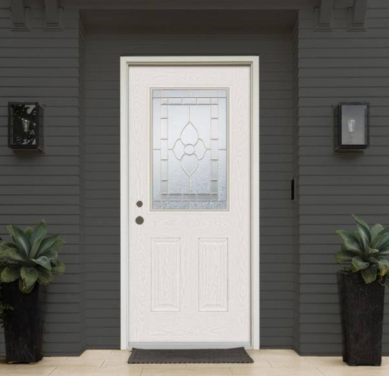 White front door on a gray house