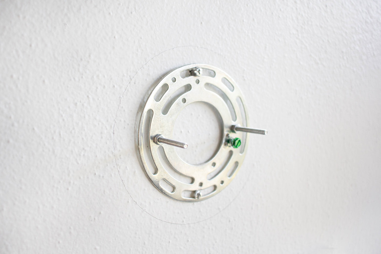 mounting plate attached to wall