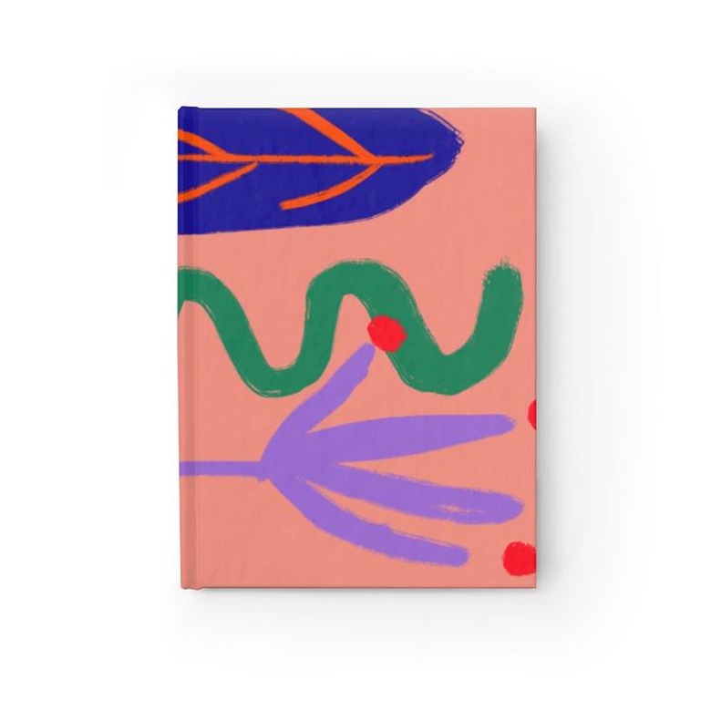 orange notebook with abstract pattern