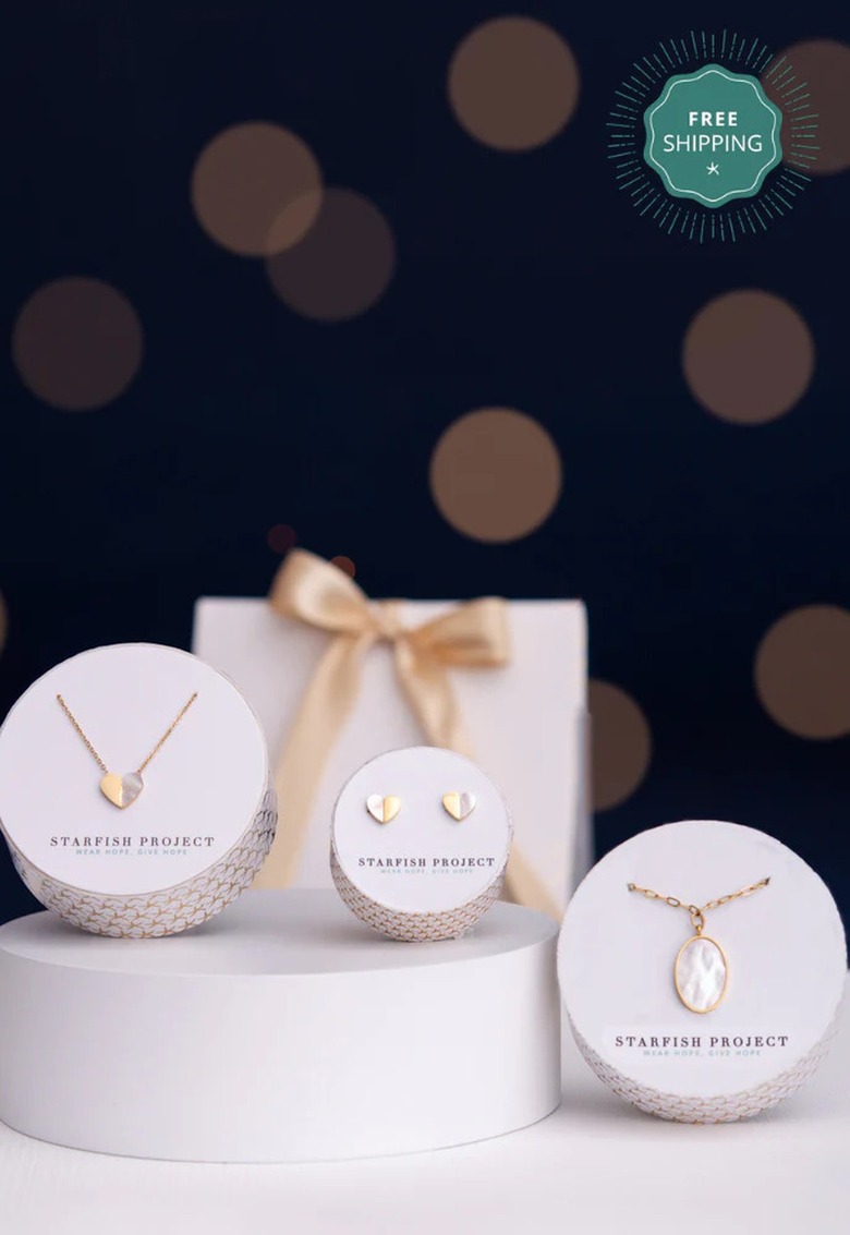 Two necklaces and one pair of earrings from Starfish Project