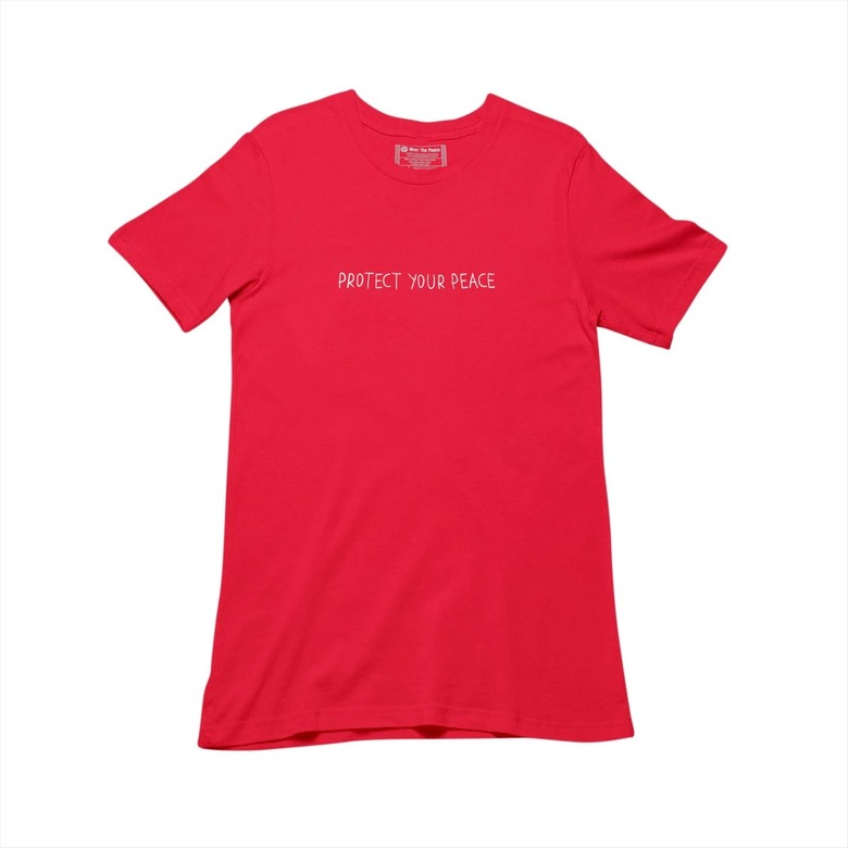 Red shirt with Protect Your Peace embroidered on the front