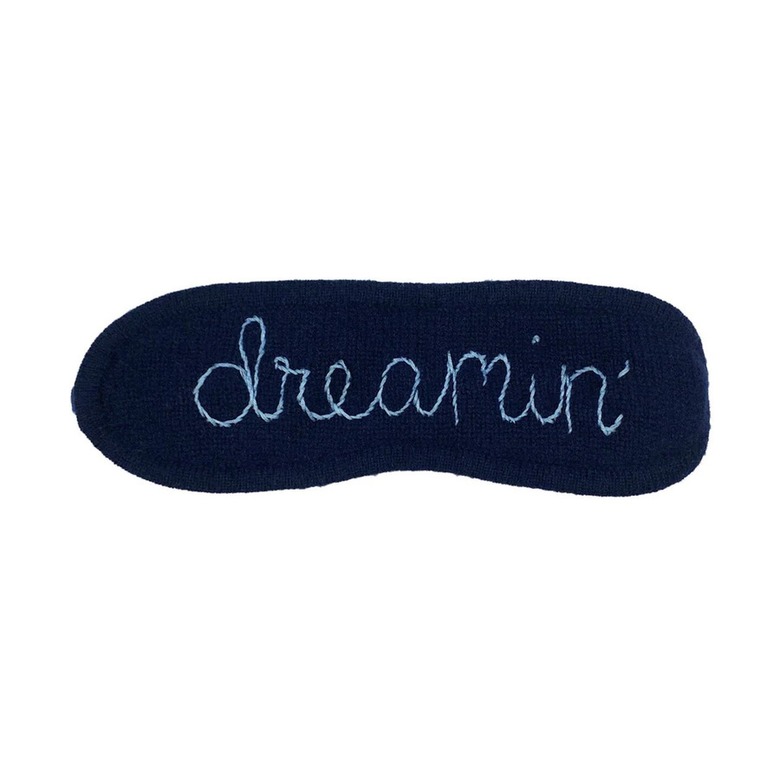 Navy eye mask for sleeping with the word dreamin'