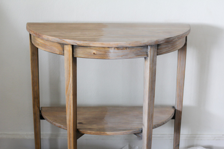 Half of the table coated with liming wax