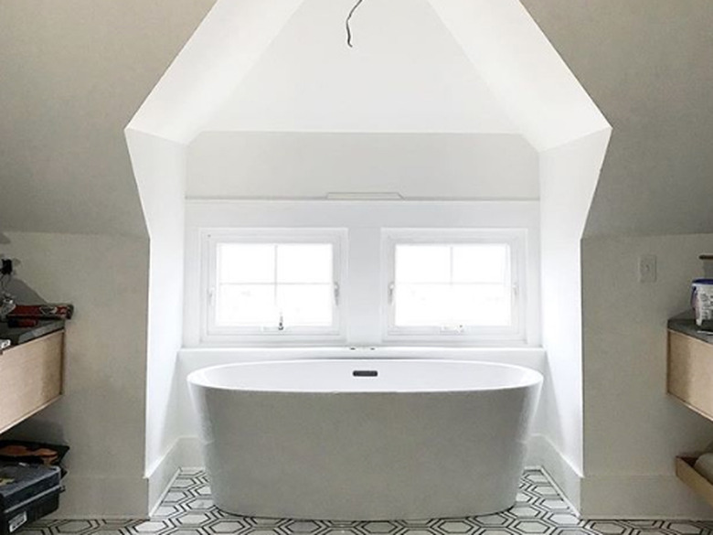 Good Bones: Restored Vintage Doors Lend Drama to a Majestic Master Bath