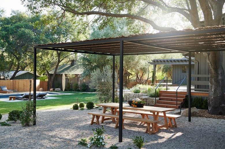 pea gravel patio with open-sided cover