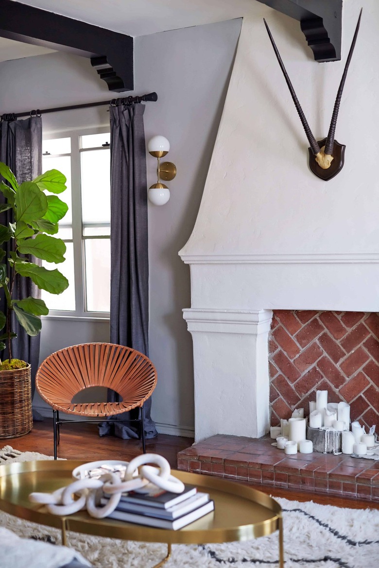 true gray wall next to white fireplace