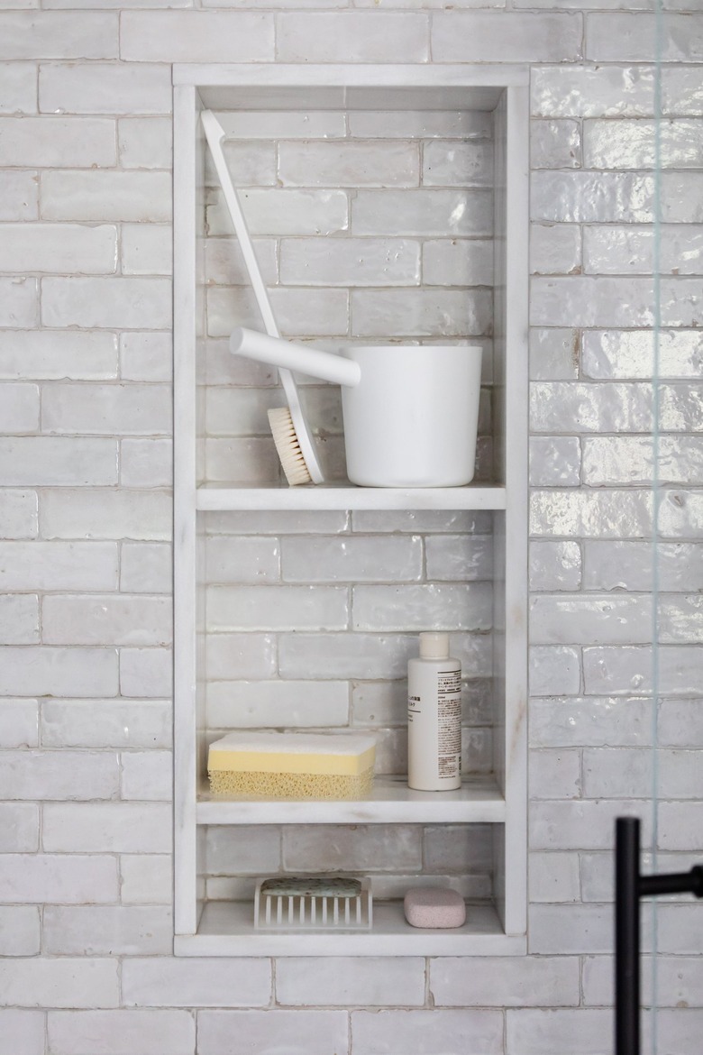 Gray tiled shower niche