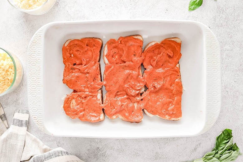 Condensed tomato soup on top of bread slices