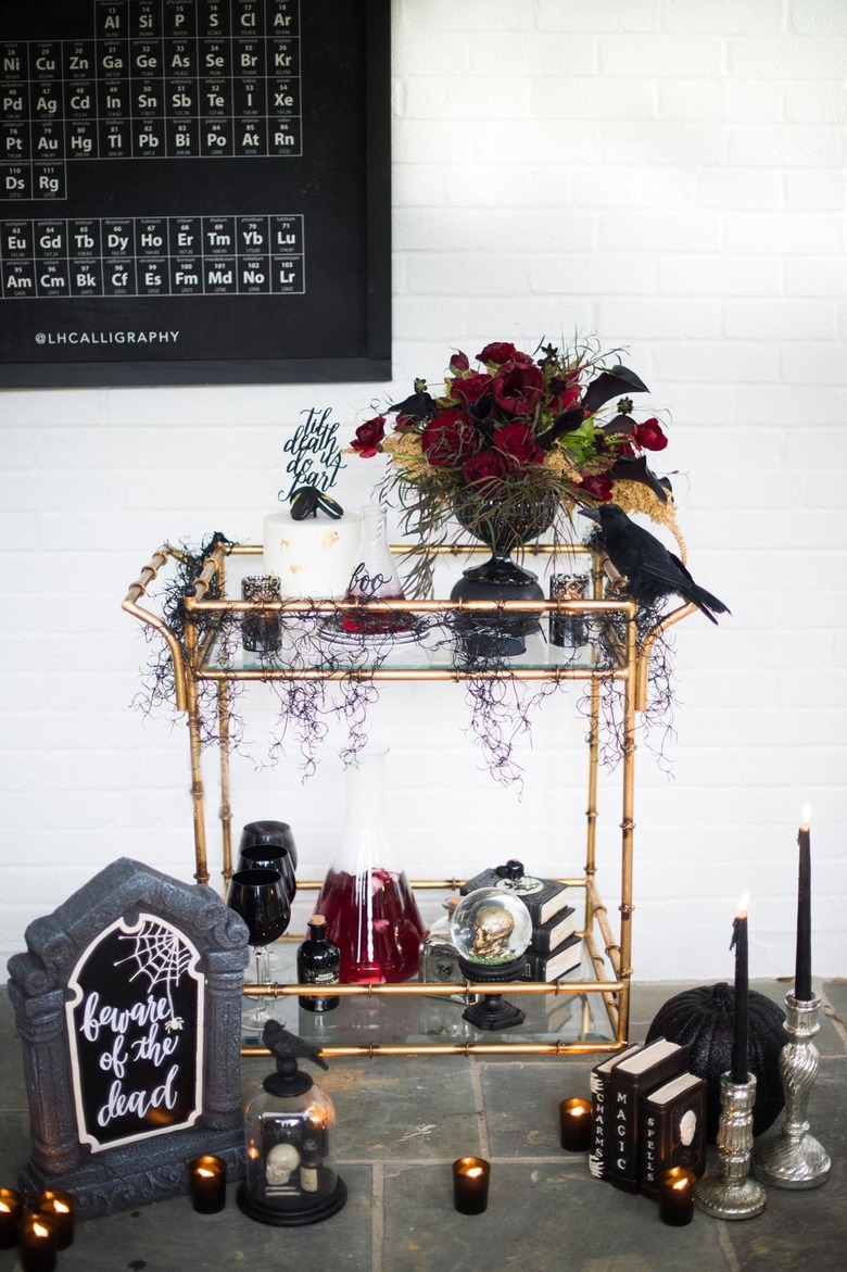 Gold bar cart with gothic elements