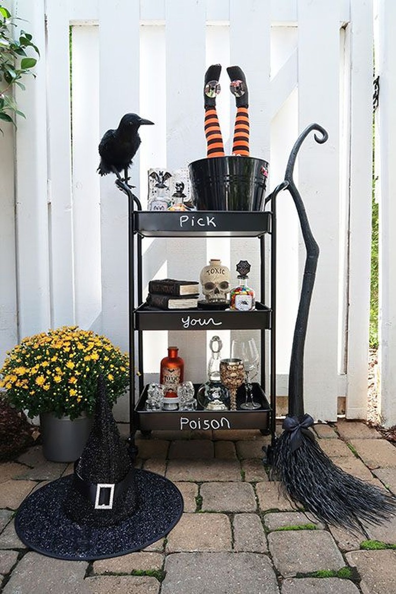Outdoor bar car with liquor and witch objects