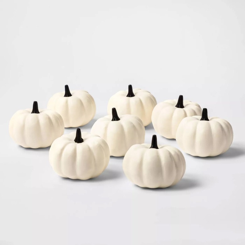set of white painted pumpkins