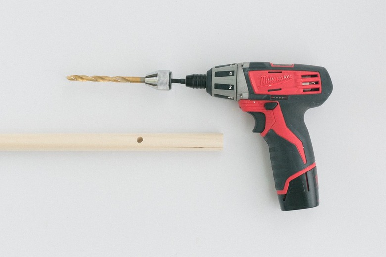 Power drill with wood dowel