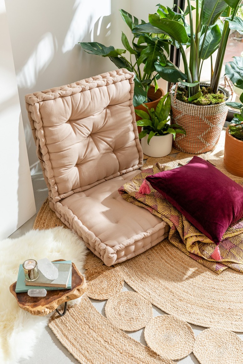 meditation area with crystals and journal