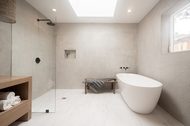 Minimalist bathroom with light gray walls