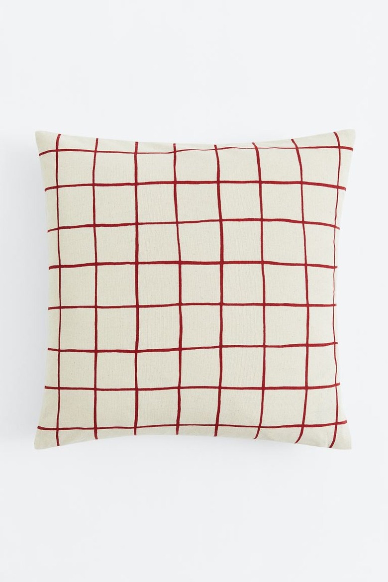 A red and white checked throw pillow.