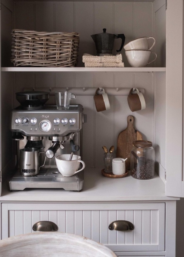 Gray kitchen cabinets with coffee maker