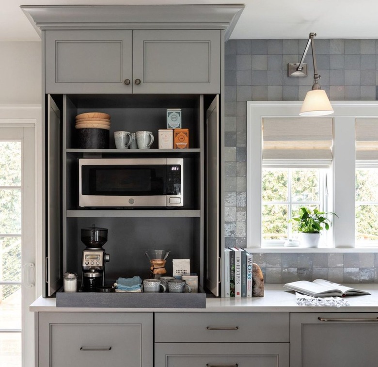 Gray kitchen with microwave