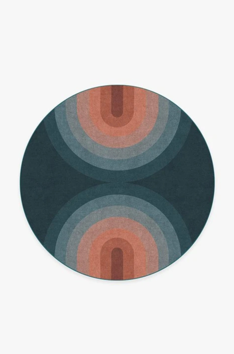 retro rainbow print in red and blue on round rug