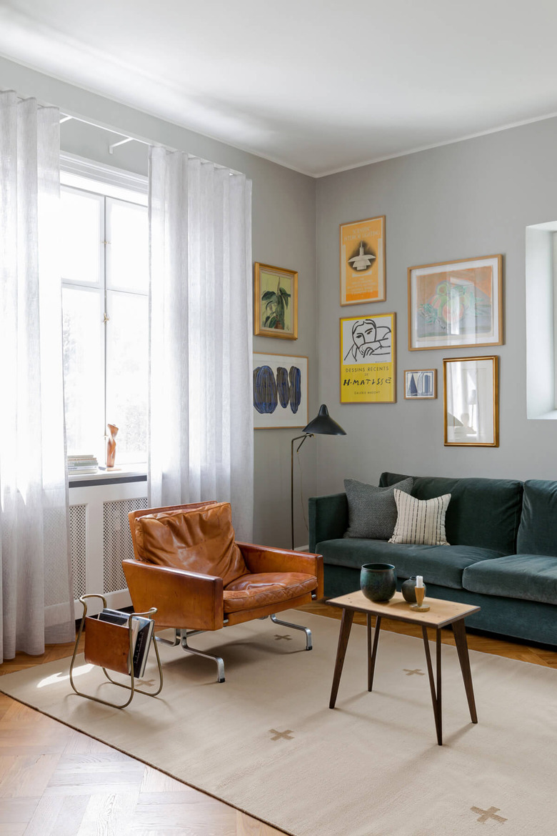 cream and tan Scandinavian area rug with crosses in midcentury room