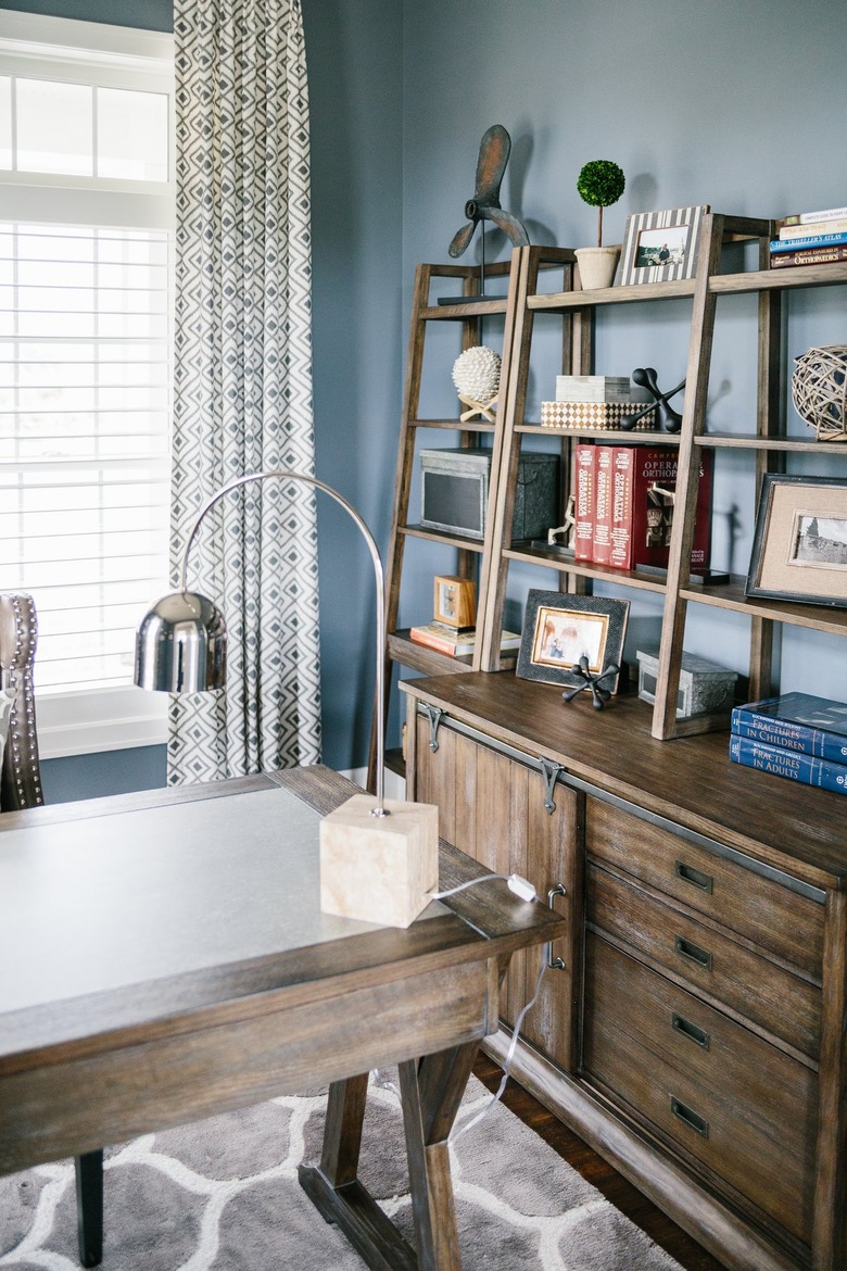 office space with large bookshelf organization with Home Office Storage Ideas