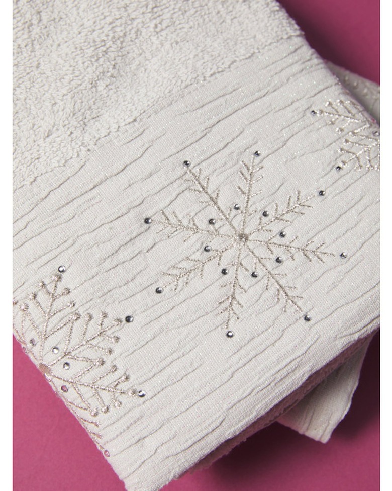 white snowflake-embroidered hand towels