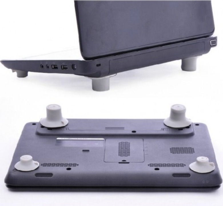 Heat reduction feet for laptop