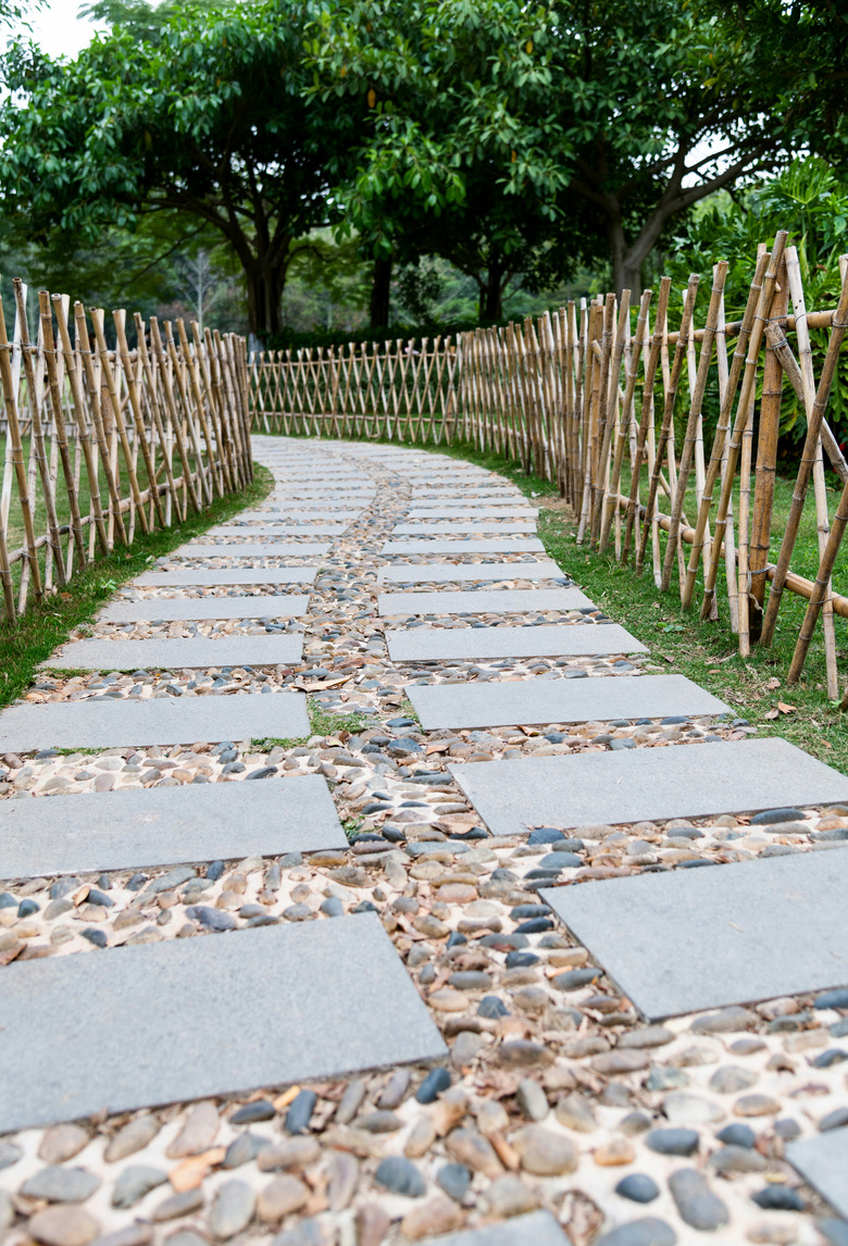 Stone path with bamboo fence in the park
