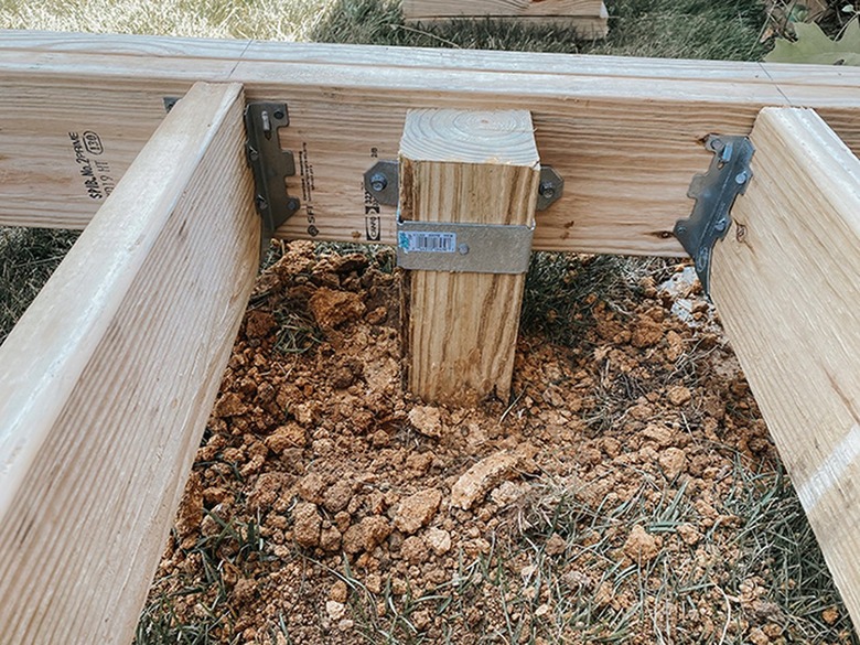 Secure anchors to the deck frame.