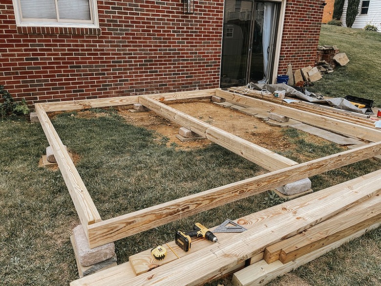 Screw the two end rim joists to the beams.