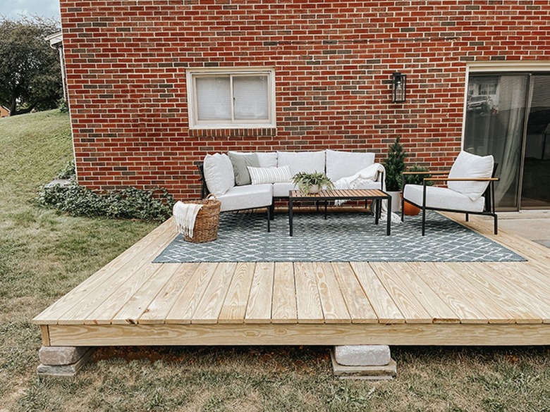 Give the wood several months to dry out before staining it.