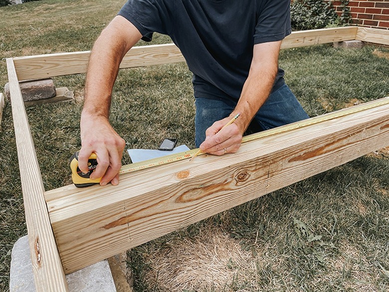 Measure and mark the beams.