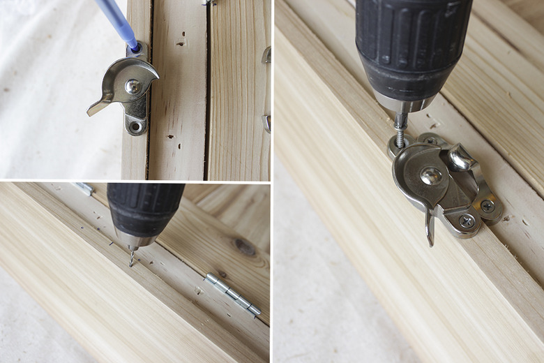 Attaching sash lock to box frame.