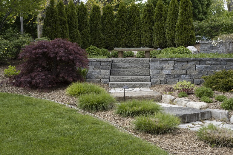 Professional Landscaping With Pavers and Boulders
