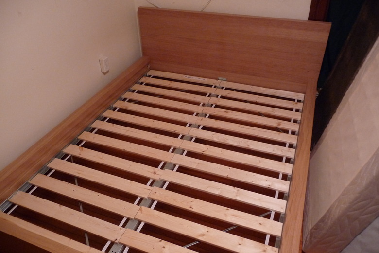 Wooden bed slats.