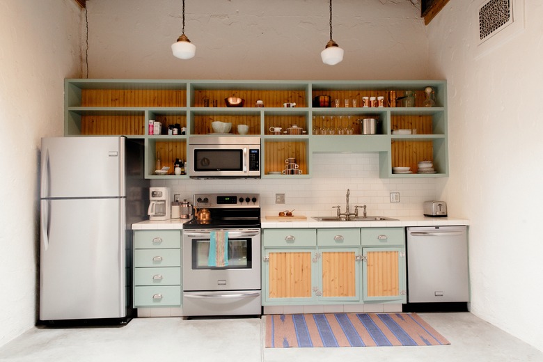 kitchen view with light teal cabinets