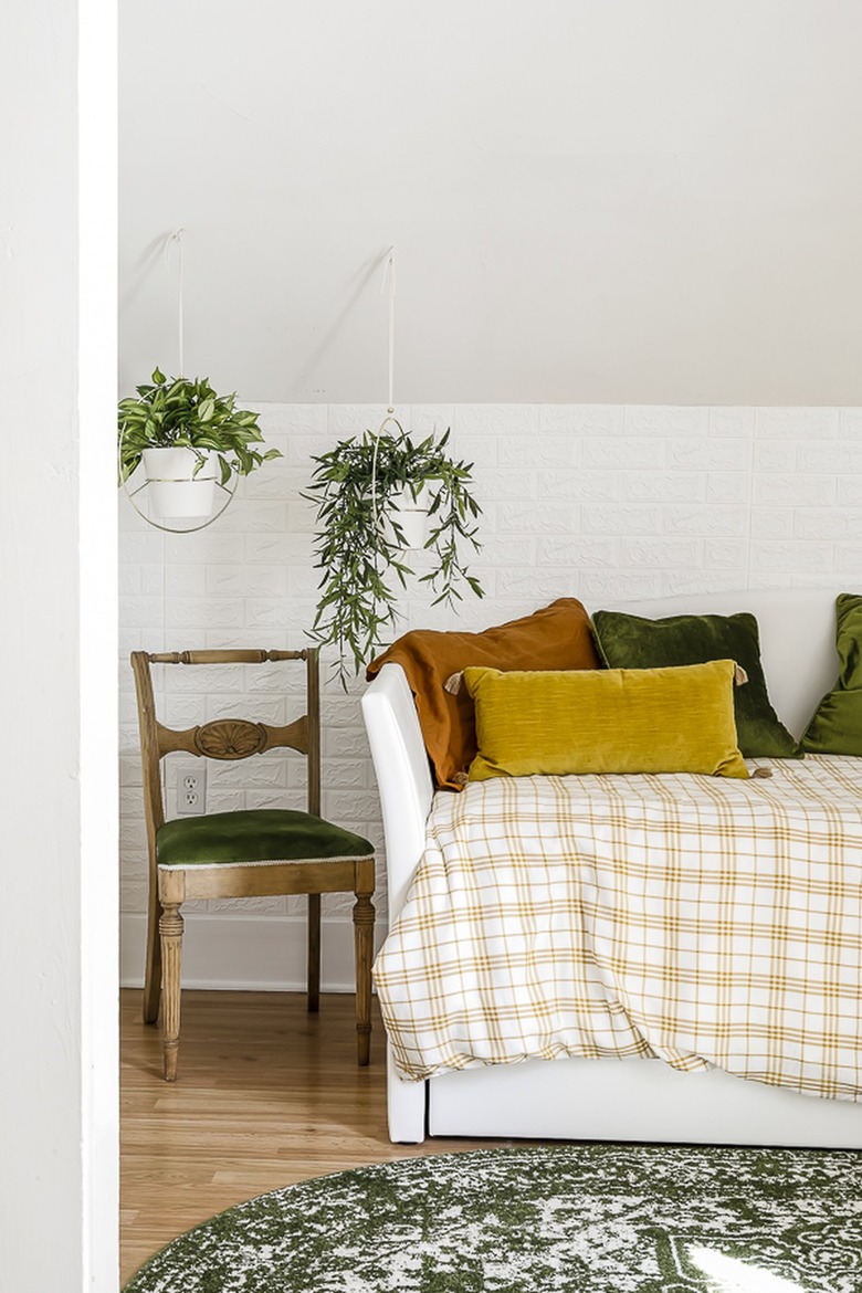 houseplants in bedroom with slanted walls