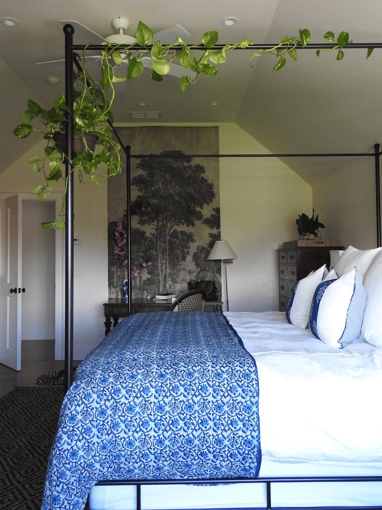 tapestry in bedroom with slanted walls