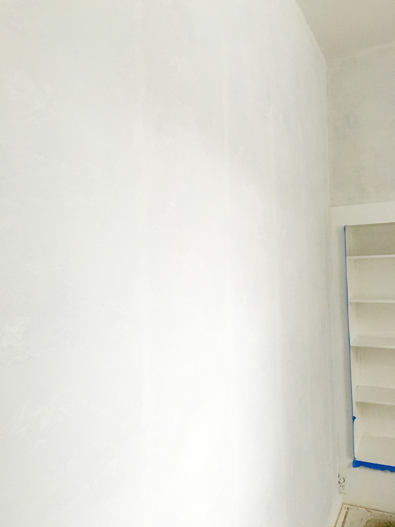 How to paint over wallpaper