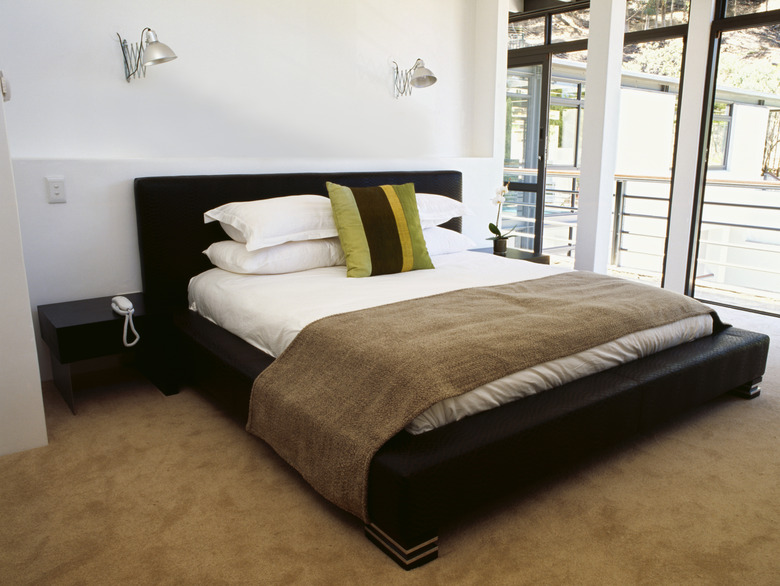 pillows on a double bed in the bedroom