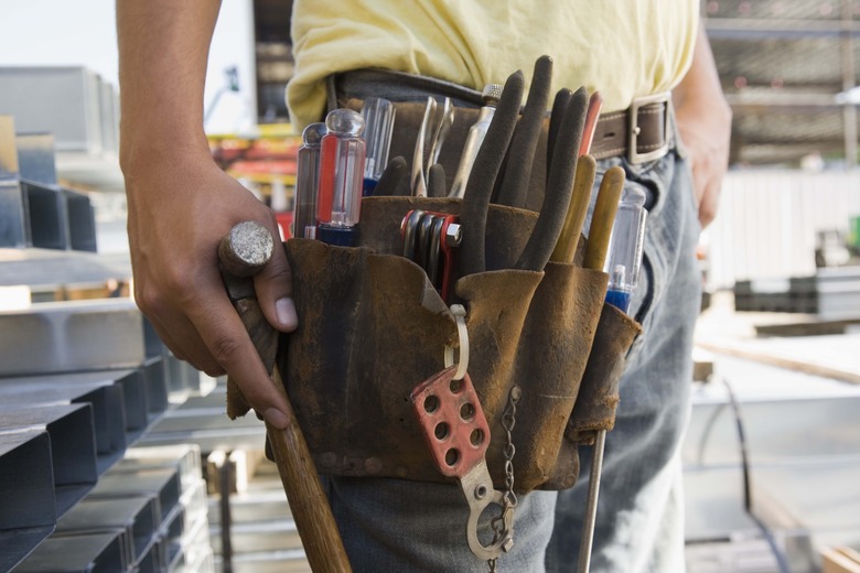 Tool belt on construction worker