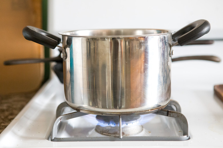 Water boiling on the stove.