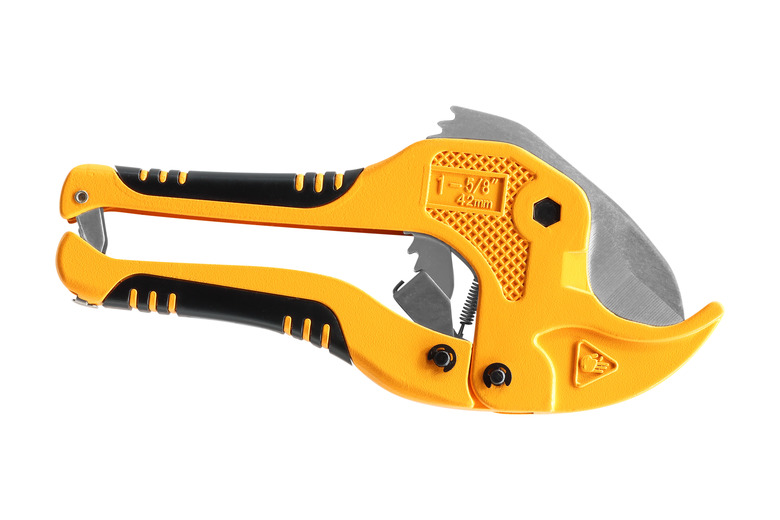 Tools for cutting polypropylene tubes isolated on white background