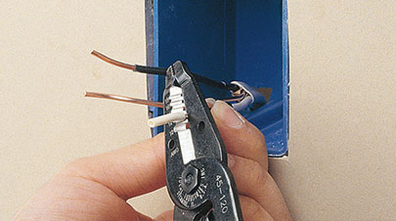 Strip wire insulation.