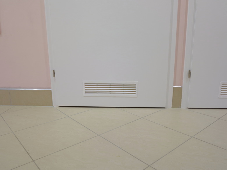 ventilation window on wooden door