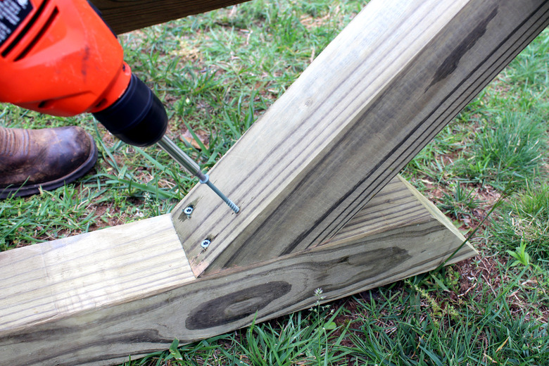 drill deck screws from 6' post into 8' post. repeat. | hammock stand DIY