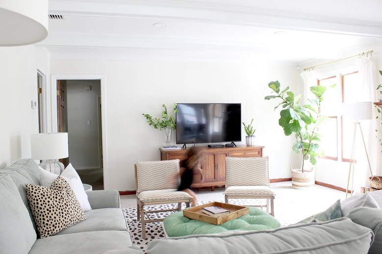knotty pine wall paneling with white paint