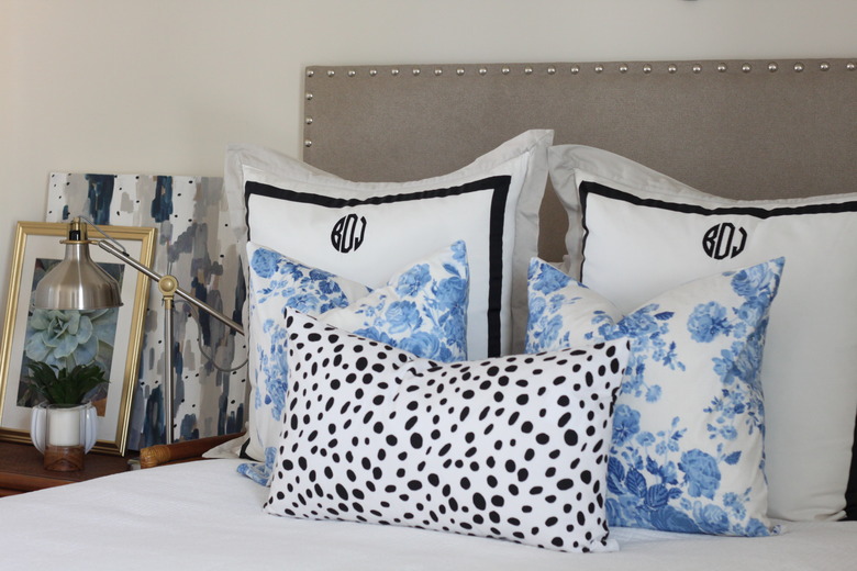 DIY upholstered headboard with nailhead trim.