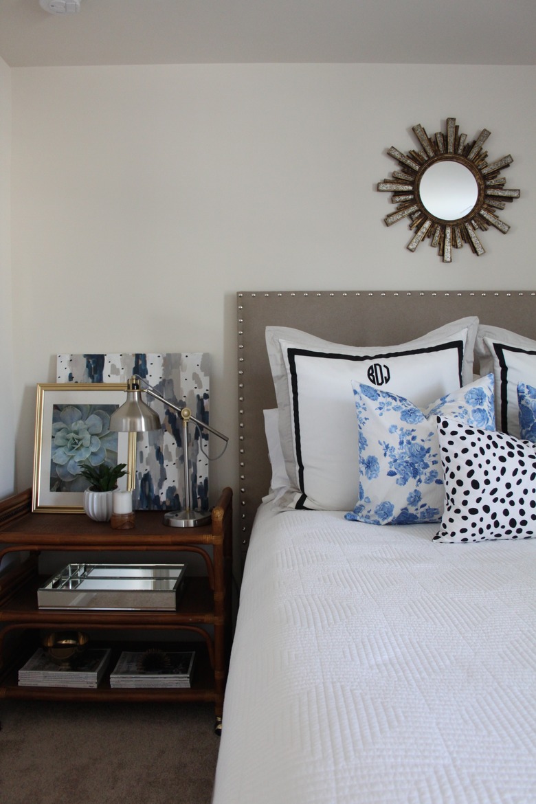 DIY upholstered headboard with nailhead trim.