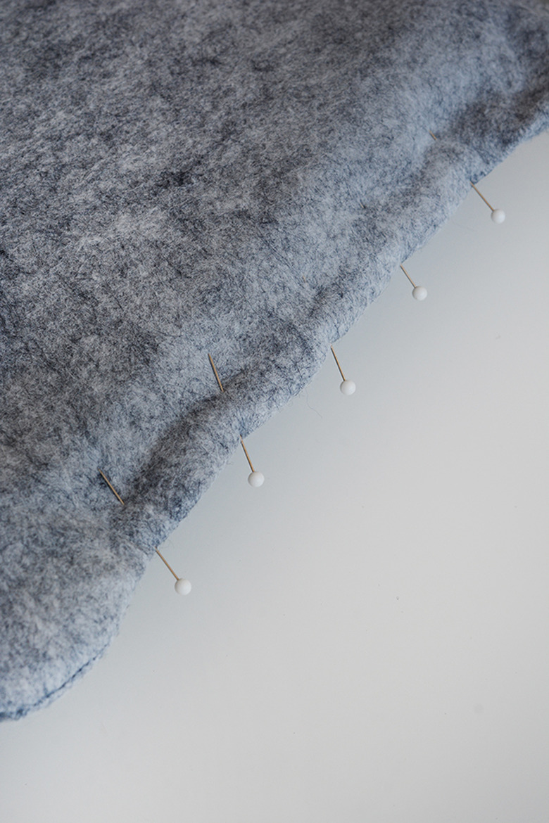 Pin the opening shut.