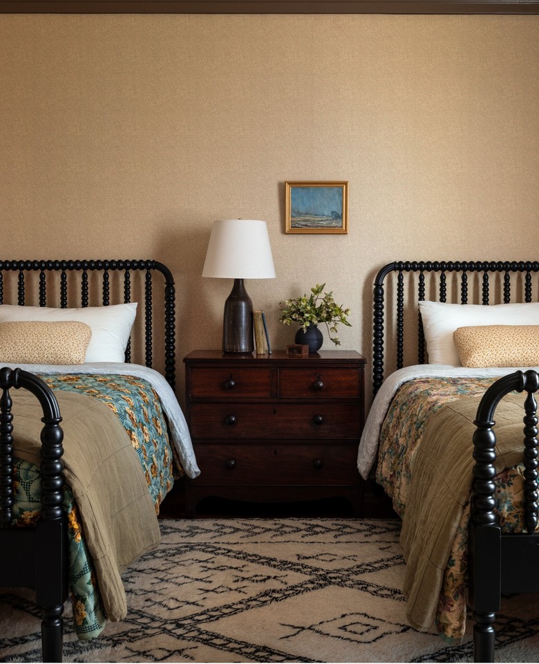 bedroom with two jenny lind beds